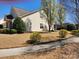 Exterior view of a home featuring light siding and mature landscaping at 86614 Arrington Rd, Lancaster, SC 29720