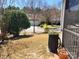 Charming front yard view of a two-story home with a well-maintained lawn and landscaping at 86614 Arrington Rd, Lancaster, SC 29720