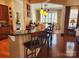 Kitchen featuring breakfast bar, granite countertops and stylish pendant lighting at 86614 Arrington Rd, Lancaster, SC 29720