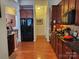A kitchen with hardwood floors, cherry cabinets, granite countertops, and stainless steel appliances at 86614 Arrington Rd, Lancaster, SC 29720