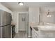 Stylish kitchen with stainless steel appliances, and white cabinetry at 9810 Campus Walk Ln # G, Charlotte, NC 28262