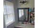 Cozy bathroom featuring a large mirror and a light fixture above the sink at 1011 Buick Ave, Kannapolis, NC 28083