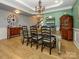 Spacious dining area with neutral decor, wood floors, and an elegant chandelier at 1021 Glen Laurel Dr, Fort Mill, SC 29707