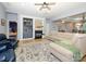 Cozy living room with fireplace, built-in shelving, and a comfortable seating area at 1021 Glen Laurel Dr, Fort Mill, SC 29707