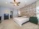 Well-lit main bedroom with carpet, stylish decor, and a comfortable atmosphere for relaxation at 1021 Glen Laurel Dr, Fort Mill, SC 29707