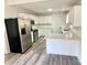 Modern kitchen featuring stainless steel appliances and quartz countertops at 10607 Wood Meadow Dr, Charlotte, NC 28227