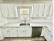 Updated kitchen featuring subway tile backsplash and stainless steel appliances at 10607 Wood Meadow Dr, Charlotte, NC 28227
