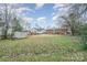 This home features a generously-sized backyard with mature trees and two storage sheds at 108 White Oak St, Chester, SC 29706