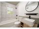 This sleek bathroom features a modern vanity, stylish fixtures, and a shower and tub combo at 108 White Oak St, Chester, SC 29706