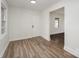 Living room with light walls, vinyl flooring and bright sunlight at 108 White Oak St, Chester, SC 29706