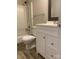 Bathroom featuring a shower-tub combination, white vanity, and modern fixtures at 11022 Harrowfield Rd, Charlotte, NC 28226