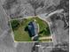 Aerial view showcasing approximate lot lines, highlighting the property's boundaries and landscaping at 121 Wichita Dr, Shelby, NC 28152