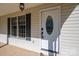 Inviting front entrance with a white door that features decorative glass and sidelight windows at 121 Wichita Dr, Shelby, NC 28152