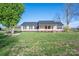 Charming single-story home featuring a well-manicured lawn and classic architectural details at 121 Wichita Dr, Shelby, NC 28152