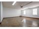 Large garage area with white walls, concrete floor, and natural light at 121 Wichita Dr, Shelby, NC 28152