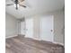 A main bedroom with modern flooring, neutral walls, and large closet space at 121 Wichita Dr, Shelby, NC 28152