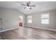 A main bedroom with bright windows leading to the attached bathroom at 121 Wichita Dr, Shelby, NC 28152