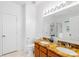 Bathroom boasts double sinks, granite countertops, a large mirror, and a glass-enclosed shower at 13521 Michael Lynn Rd, Charlotte, NC 28278
