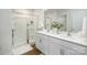 Bathroom features double sink vanity with modern fixtures and a glass-enclosed shower at 140 Falling Up Ln, Salisbury, NC 28147
