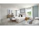 Comfortable bedroom with two windows, carpet flooring, accent chairs, and a dresser at 140 Falling Up Ln, Salisbury, NC 28147