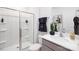 Modern bathroom showcasing a sleek vanity, glass-enclosed shower, and contemporary accessories at 146 Falling Up Ln, Salisbury, NC 28147