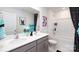 Bathroom featuring double vanity, shower with tub, and stylish decor at 146 Falling Up Ln, Salisbury, NC 28147