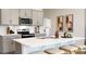 Gourmet kitchen featuring an island with seating, modern appliances, and ample counter space at 146 Falling Up Ln, Salisbury, NC 28147