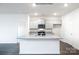 Modern kitchen with granite countertops and stainless steel appliances at 152 Falling Up Ln, Salisbury, NC 28147