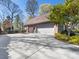 This home features a wide driveway leading up to the 2-car garage at 153 Stafford Estates Dr, Salisbury, NC 28146