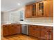 This kitchen features wood cabinets, white countertops, and stainless steel appliances at 153 Stafford Estates Dr, Salisbury, NC 28146
