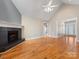 Bright living room with a fireplace and hardwood floors at 153 Stafford Estates Dr, Salisbury, NC 28146