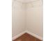 Corner of walk-in closet with neutral walls, carpet, and wire shelving for storage and organization at 1530 Doran Ter, Richburg, SC 29729