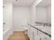 Bathroom with granite countertop vanity, full mirror, new toilet, and tub and shower combination at 1564 Doran Ter, Richburg, SC 29729