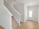 Inviting entryway with light wood floors and a staircase at 1564 Doran Ter, Richburg, SC 29729