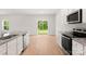 Kitchen with stainless steel appliances, granite countertops, and a sliding glass door at 1564 Doran Ter, Richburg, SC 29729