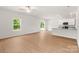 Bright open living space with a sliding glass door and view of the kitchen at 1564 Doran Ter, Richburg, SC 29729