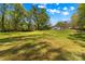 Large grassy backyard with the house in the background at 1725 Bristol Rd, Statesville, NC 28677