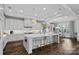 Spacious kitchen featuring marble island, stainless steel appliances, and a breakfast nook with natural light at 19329 Watermark Dr # 531, Cornelius, NC 28031