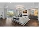 Spacious living room with fireplace, access to balcony and luxury furniture at 19329 Watermark Dr # 531, Cornelius, NC 28031