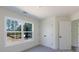 Bright bedroom with carpeted floor, closet, and large window at 202 Westerwood Dr, Rock Hill, SC 29732