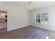 Bedroom with wood floor, ceiling fan and large window for natural light at 202 Westerwood Dr, Rock Hill, SC 29732
