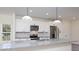 Beautiful kitchen features stainless steel appliances, granite countertops, and ample cabinet space at 202 Westerwood Dr, Rock Hill, SC 29732