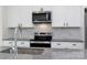 The Kitchen includes granite countertops, stainless steel appliances, subway tile backsplash, and stylish fixtures at 202 Westerwood Dr, Rock Hill, SC 29732