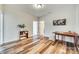Bright office with hardwood floors, a wooden desk, and neutral decor at 2023 Aragon Ln, Gastonia, NC 28056