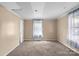 Bedroom featuring neutral walls, carpet floor, and a window at 203 Jackson St, Fort Mill, SC 29715