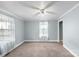 Bedroom featuring neutral walls, ceiling fan, carpet floor, and a window at 203 Jackson St, Fort Mill, SC 29715