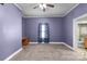 Spacious bedroom with carpet, ceiling fan and natural light from the window at 203 Jackson St, Fort Mill, SC 29715