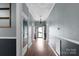 Hallway with doors, lighting fixture and hardwood floors at 203 Jackson St, Fort Mill, SC 29715
