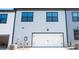 Exterior shot of home featuring a white two-car garage at 219 Halemarg Dr, Belmont, NC 28012