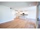 An open floorplan living room that leads to the kitchen and the stairs at 219 Halemarg Dr, Belmont, NC 28012